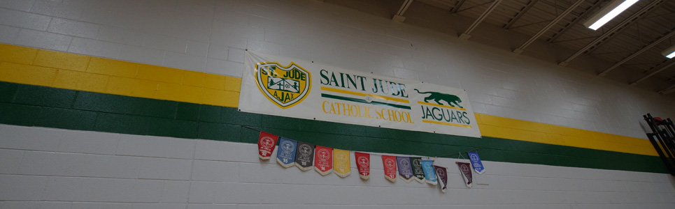Banner in gym, "Saint Jude Catholic School Jaguars"