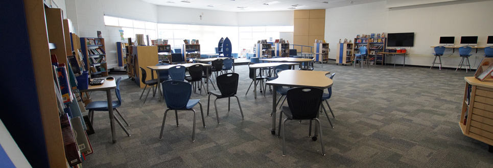 Empty library with tables and chairs.